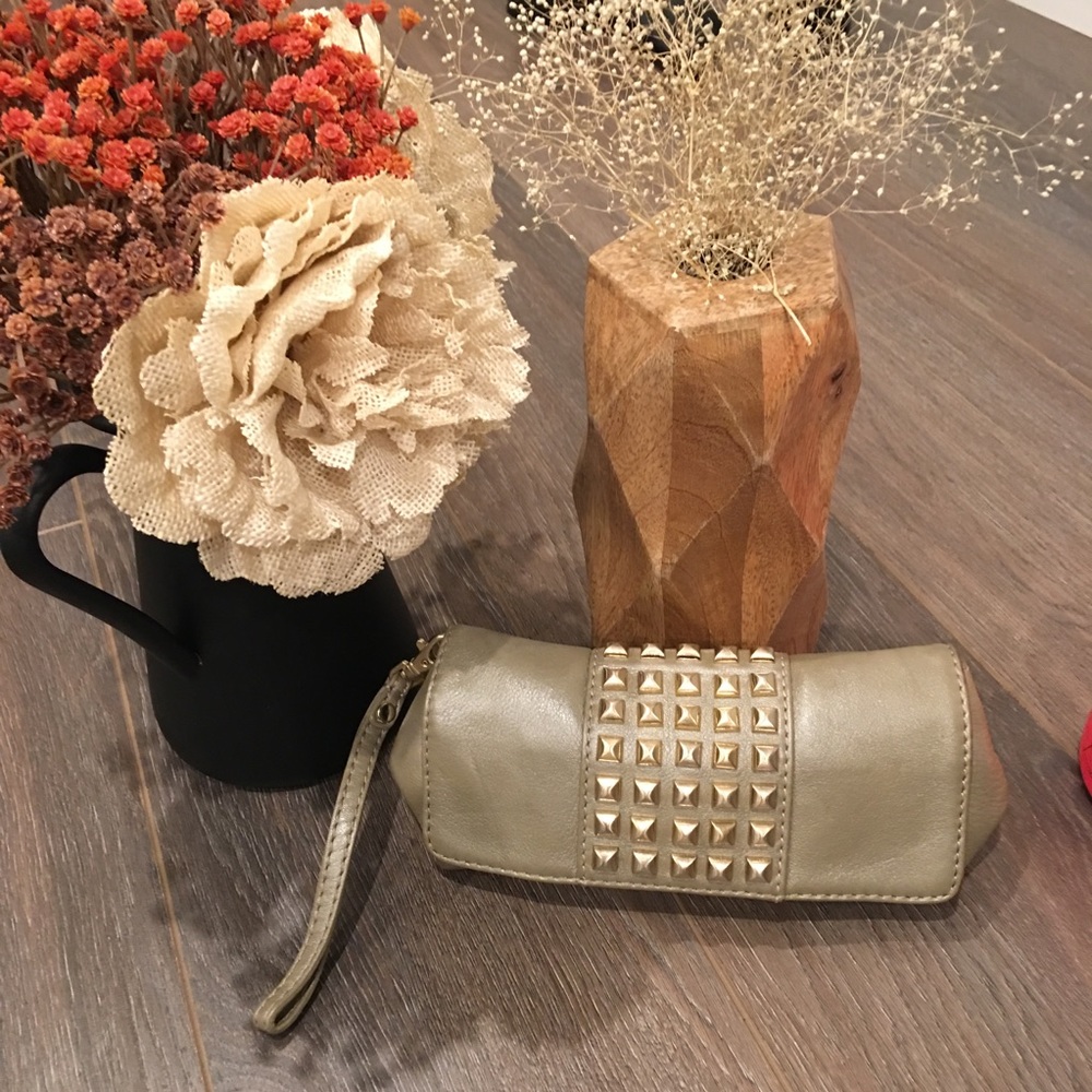 Stuart Weitzman wristlet clutch with studs